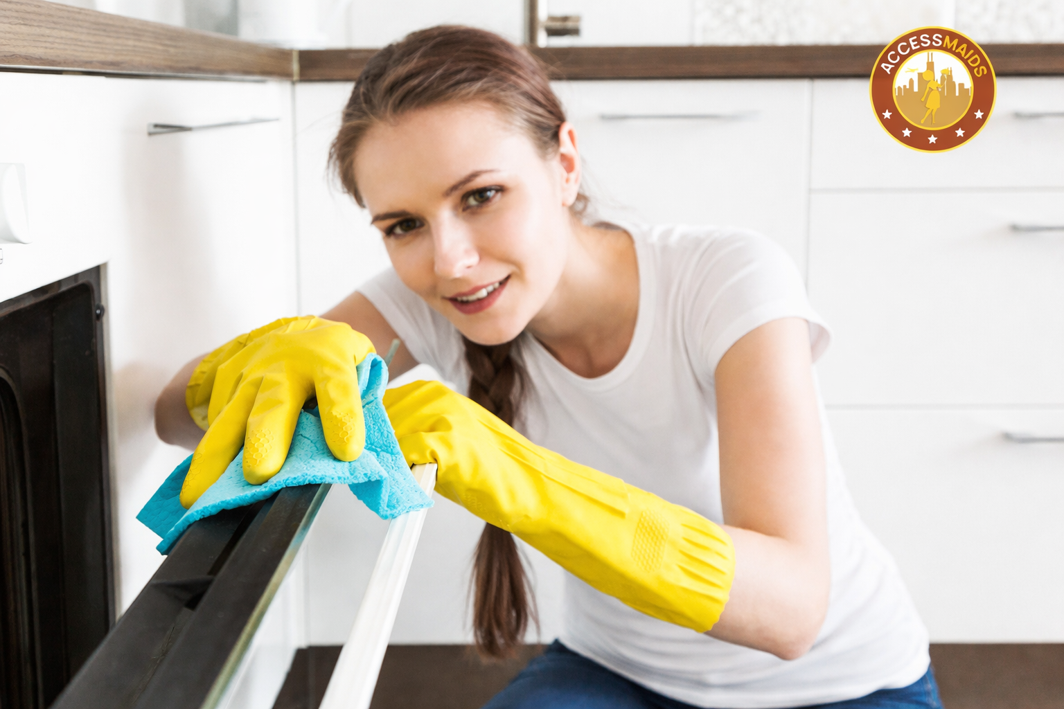 AccessMaids cleaning an oven in a Chicago kitchen